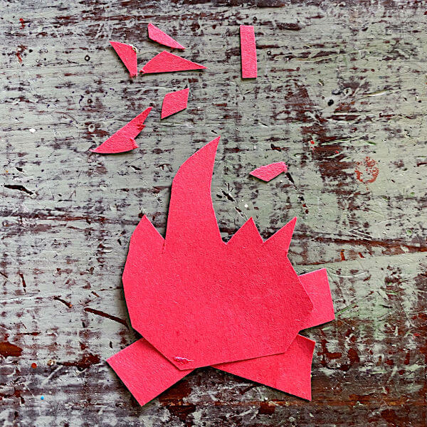 Campfire artwork made from red paper