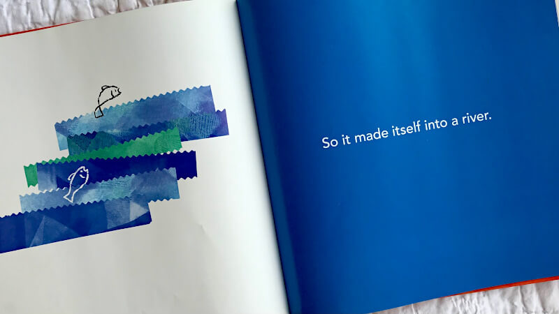 Inside pages of Perfect Square picture book showing blue ribbons of paper stacked up to make a river with fish jumping in it with the words "So it made itself into a river."