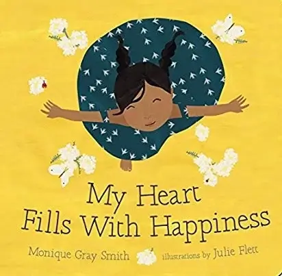 Kids' Books about Gratitude - My Heart Fills with Happiness - Book Cover - Top View of a smiling girl spinning with arms outstretched on a yellow background